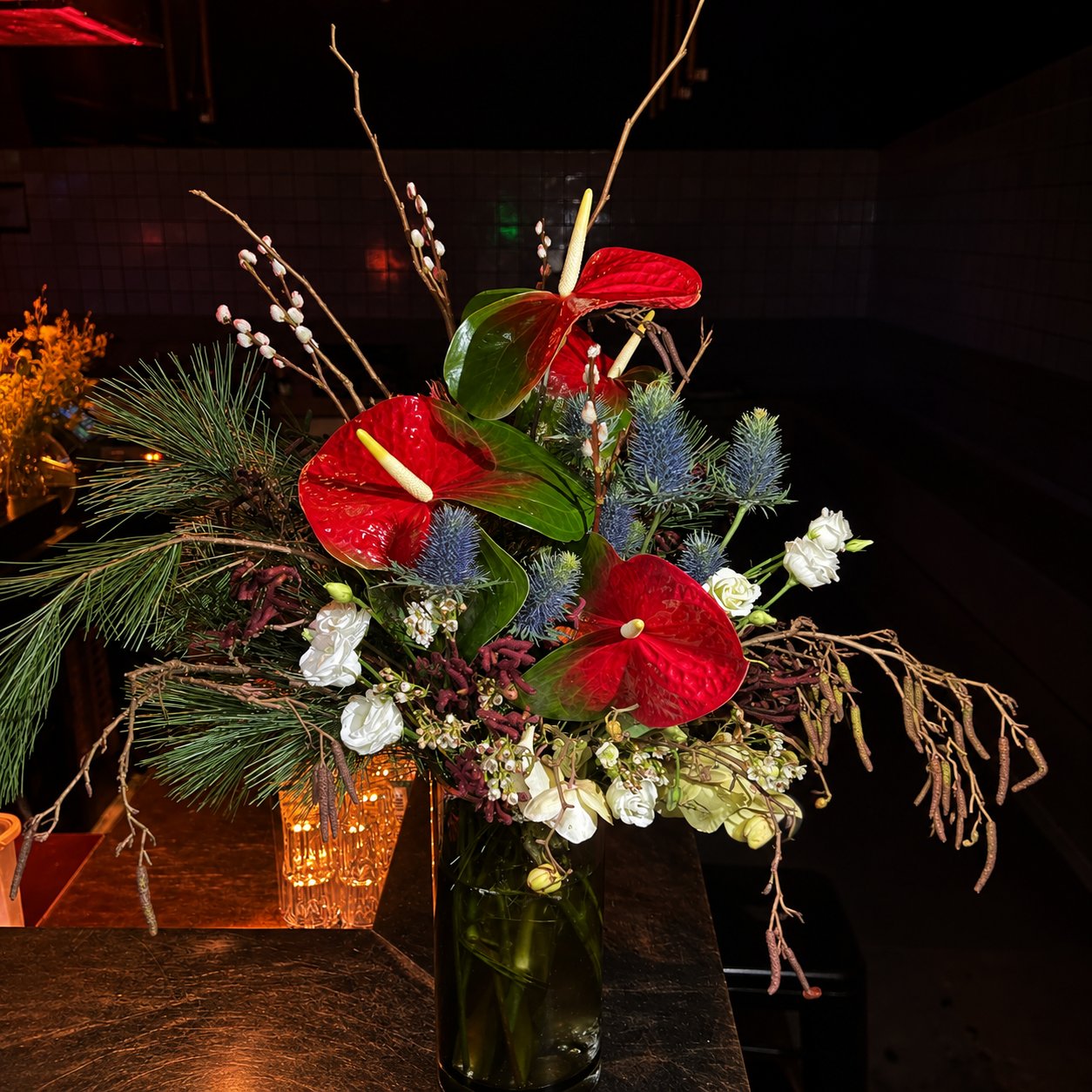 Red anthurium bar arrangement at OHM club, Berlin.